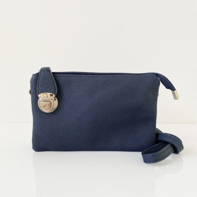 Navy textured multi pouch wristlet/crossbody
