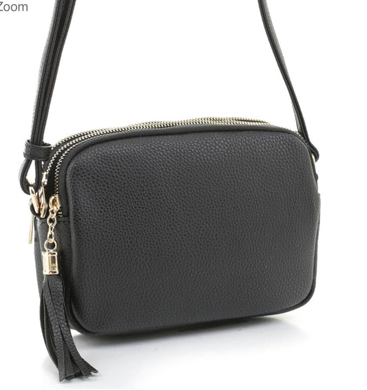 Black crossbody with 3 sections and tassel zipper
