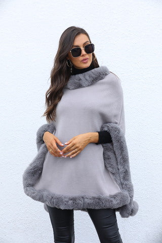 Grey faux fur poncho with arm cut ups