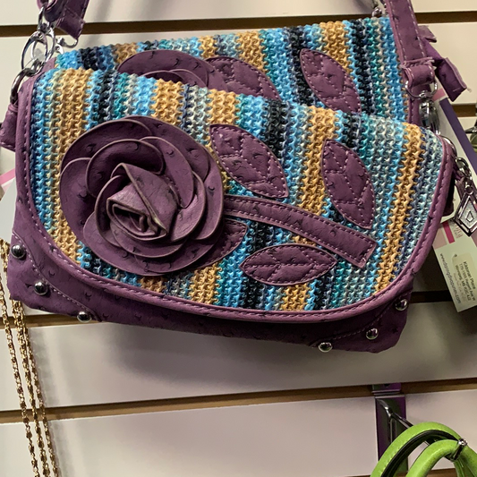 Purple clutch messenger with flower front