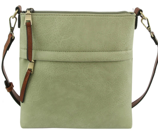 Mint crossbody with brown strap and zipper pulls