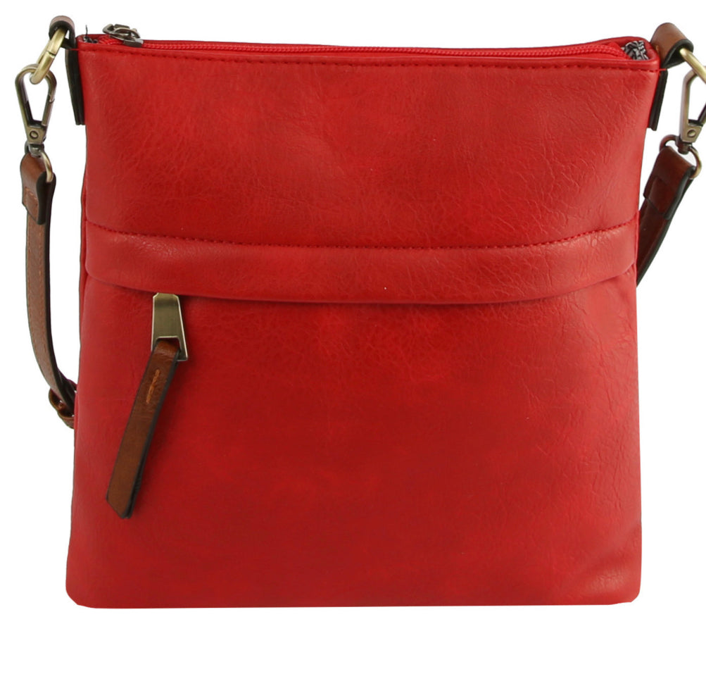 Red crossbody with brown strap and zipper pulls