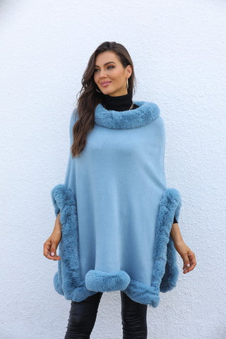 Blue faux fur poncho with arm cut ups