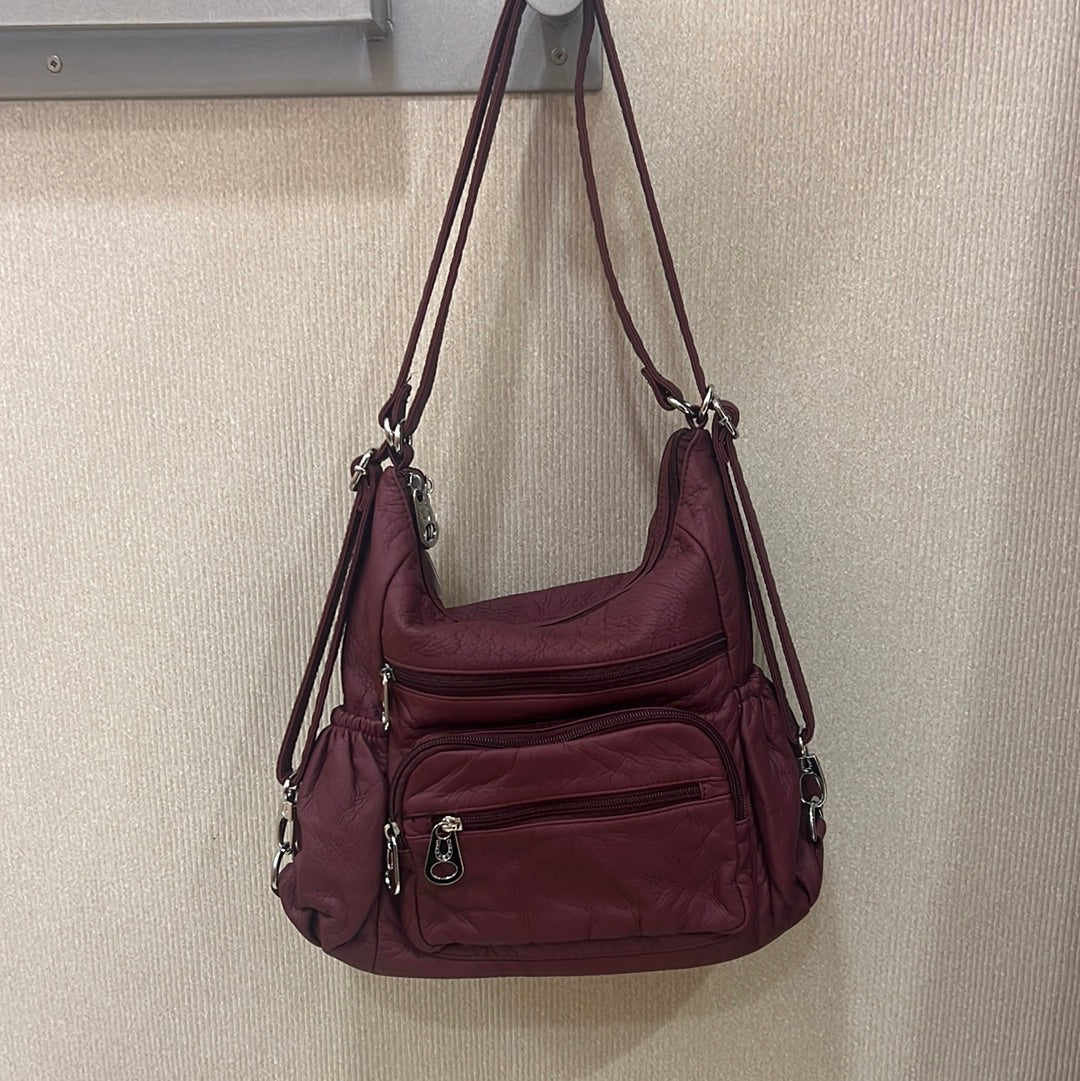 Plum 3 in 1 with zip front pouch and elastic pocket sides